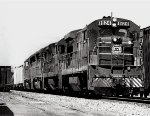 Seaboard Coast Line U36B #1824 with another U36B and two SD45's leading Waycross (GA) bound train SCL #307 past the depot